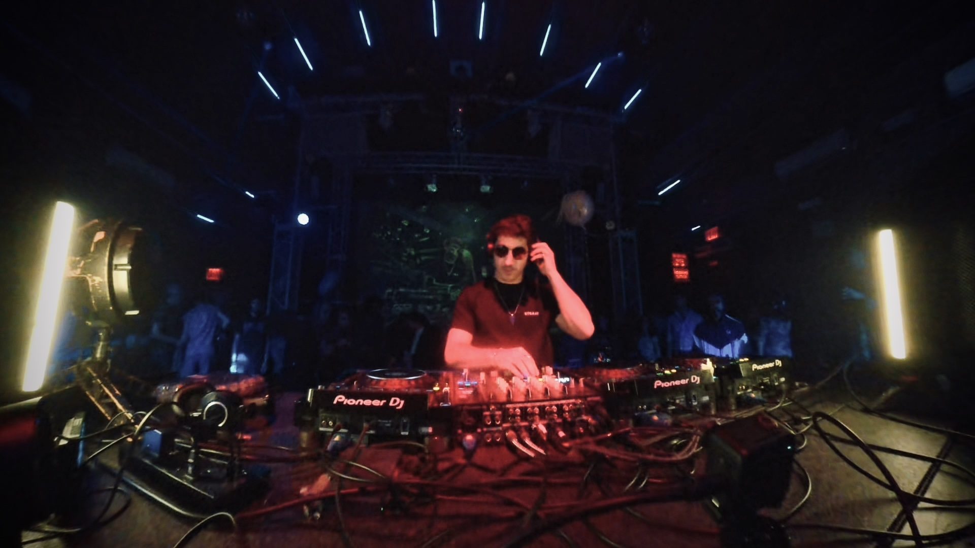 Kosain press photo 4: DJing behind Pioneer DJ decks